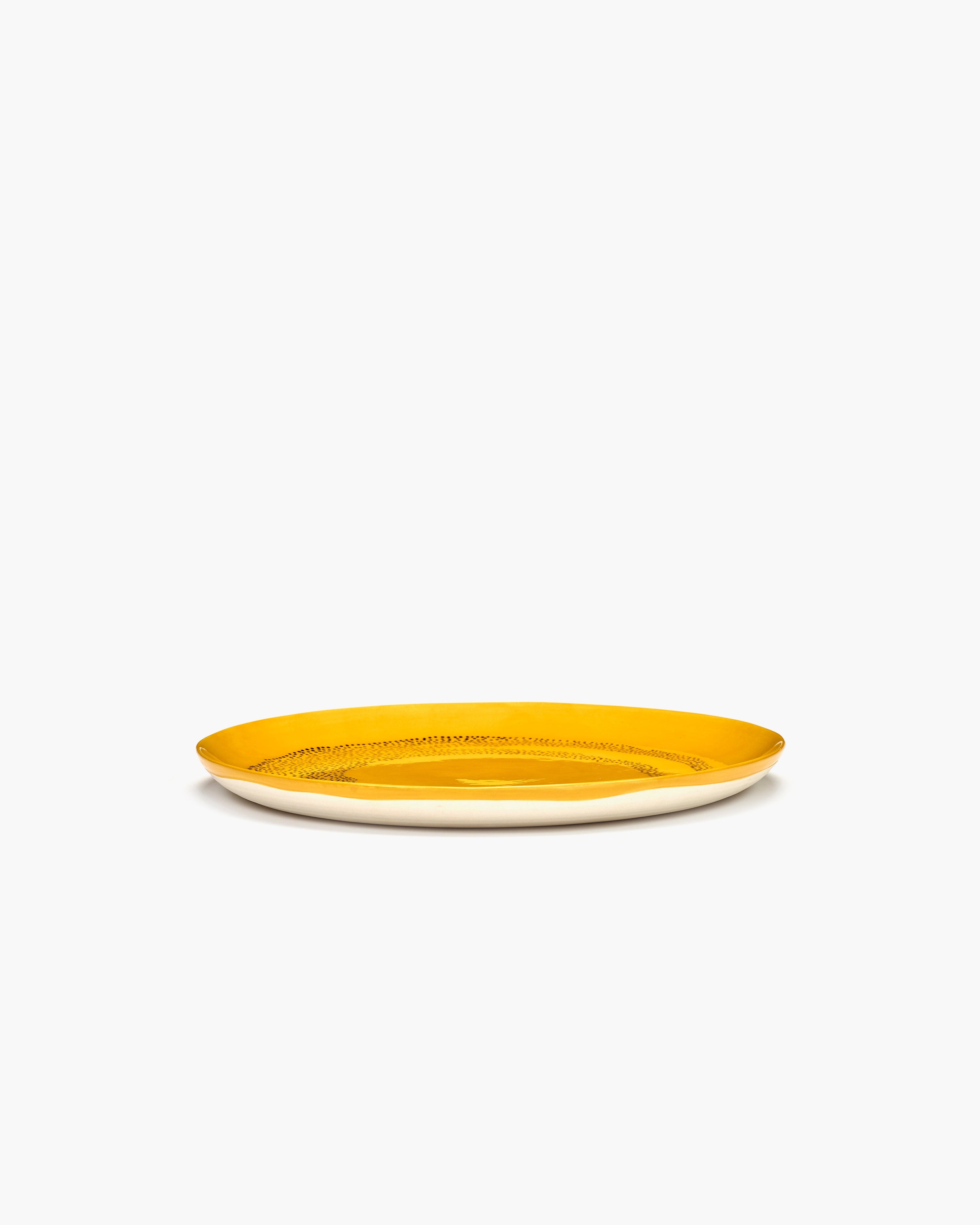 FEAST - assiette plate jaune - pois noirs